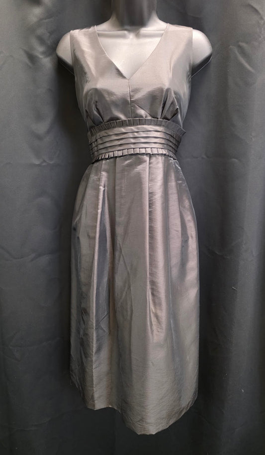 Tank Style Neckline with Ruffled Waistband
